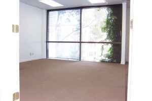 TILE AND WOOD FLOOR RECEPTION AREA. 5 OFFICES AND LARGE ROOM